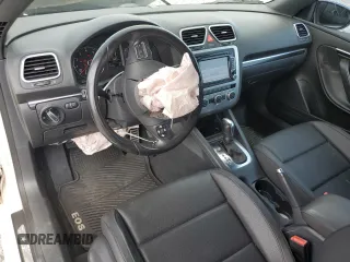 2013 Volkswagen Eos Sport с VIN WVWBW8AH8DV001948, выставлен на аукционе Copart как лот 56292615 с пробегом 75 398 миль миль и На запчасти • Non repairable. История ставок и продаж доступна на DreamBid. Изображение 8.