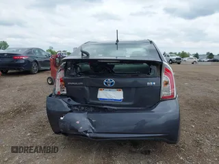 2015 Toyota Prius Four z VIN JTDKN3DU5F1934117, wystawiony jako IAAI lot #42370807 z przebiegiem 67 806 mil mil oraz . Historia ofert i sprzedaży dostępna na DreamBid. Obrazek 16.