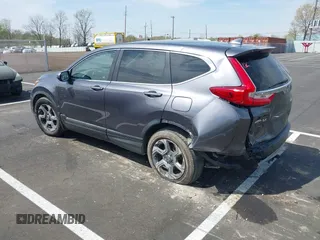 2017 Honda CR-V EX-L with VIN 7FARW1H89HE002384, listed as a IAAI auction lot 41908640 with 131,229 mi miles. Bid and sale history available at carsss.com. Image 3.