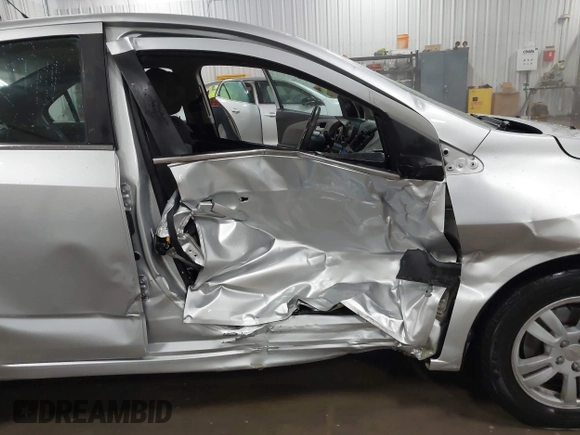 2014 Chevrolet Sonic LT with VIN 1G1JC5SG8E4107664, listed as a IAAI auction lot 41614306 with 128,946 mi miles and . Bid and sale history available at DreamBid. Image 6.