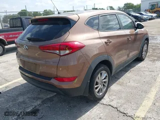 2016 Hyundai Tucson SE with VIN KM8J23A4XGU180300, listed as a IAAI auction lot 42123067 with 123,804 mi miles. Bid and sale history available at carsss.com. Image 4.