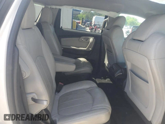 2012 Chevrolet Traverse LTZ z VIN 1GNKRLED5CJ233616, wystawiony jako Copart lot #52309145 z przebiegiem Nie podano mil oraz Szkoda całkowita • Salvage title. Historia ofert i sprzedaży dostępna na DreamBid. Obrazek 11.