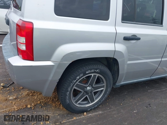2009 Jeep Patriot Sport z VIN 1J4FT28B29D110728, wystawiony jako IAAI lot #42264825 z przebiegiem 194 459 mil mil oraz . Historia ofert i sprzedaży dostępna na DreamBid. Obrazek 6.