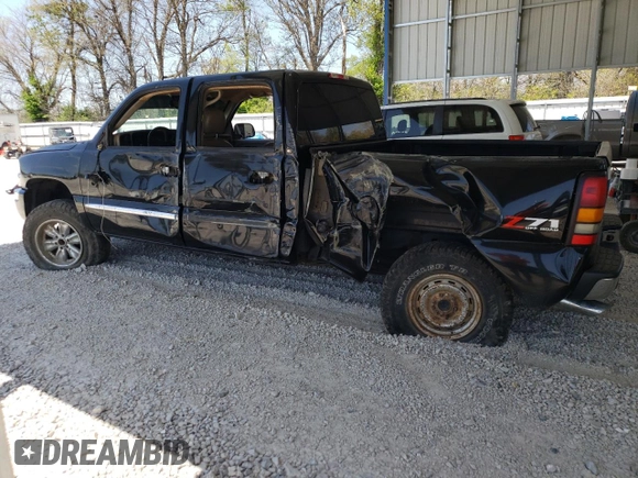 2004 GMC Sierra 1500 SLE z VIN 2GTEK13TX41377215, wystawiony jako Copart lot #53242885 z przebiegiem 202 070 mil mil oraz Szkoda całkowita • Salvage title. Historia ofert i sprzedaży dostępna na DreamBid. Obrazek 2.