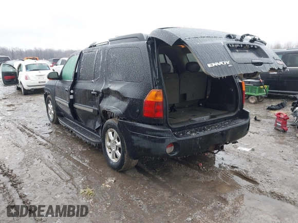 2005 GMC Envoy XL SLE with VIN 1GKET16S156160473, listed as a IAAI auction lot 41510661 with 233,942 mi miles. Bid and sale history available at carsss.com. Image 3.