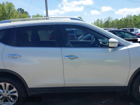 2016 Nissan Rogue SV with VIN KNMAT2MT2GP633600, listed as a IAAI auction lot 39191100 with 128,051 mi miles and . Bid and sale history available at DreamBid. Image 13.