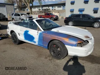 1994 Ford Mustang with VIN 1FALP45T8RF205391, listed as a Copart auction lot 54699065 with 167,335 mi miles and Salvage title. Bid and sale history available at DreamBid. Image 4.