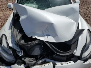 2021 Tesla Model 3 Standard Range Plus with VIN 5YJ3E1EA5MF100477, listed as a Copart auction lot 51516425 with 41,484 mi miles and Salvage Title. Bid and sale history available at carsss.com. Image 12.
