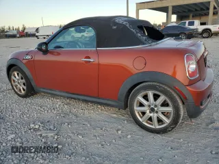 2013 MINI Roadster S z VIN WMWSY3C55DT594614, wystawiony jako Copart lot #87357464 z przebiegiem 119 449 mil mil oraz Tytuł czysty. Historia ofert i sprzedaży dostępna na DreamBid. Obrazek 2.