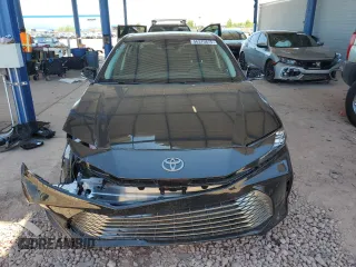 2025 Toyota Camry LE z VIN 4T1DAACK5SU592617, wystawiony jako Copart lot #56370875 z przebiegiem 1 615 mil mil oraz Szkoda całkowita • Salvage title. Historia ofert i sprzedaży dostępna na DreamBid. Obrazek 5.