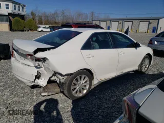 2014 Toyota Camry L with VIN 4T4BF1FK8ER397268, listed as a Copart auction lot 52114735 with 122,210 mi miles and Clean Title. Bid and sale history available at DreamBid. Image 3.