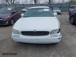 1999 Buick Park Avenue Ultra with VIN 1G4CU5217X4658627, listed as a IAAI auction lot 42013174 with 148,856 mi miles. Bid and sale history available at carsss.com. Image 12.