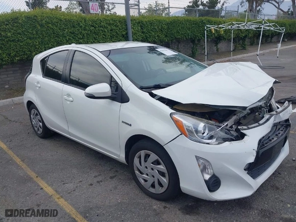 2015 Toyota Prius c One with VIN JTDKDTB3XF1097538, listed as a IAAI auction lot 42031057 with 100,847 mi miles. Bid and sale history available at carsss.com. Image 1.