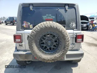 2021 Jeep Wrangler Unlimited Sahara with VIN 1C4HJXEN3MW592171, listed as a Copart auction lot 62216705 with 85,257 mi miles and Salvage title. Bid and sale history available at DreamBid. Image 6.