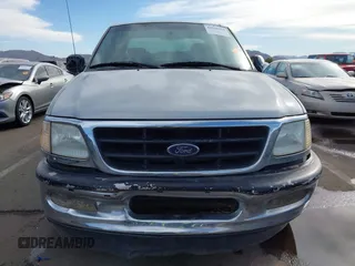 2001 Ford F-150 XL z VIN 1FTRX17W61NA73638, wystawiony jako IAAI lot #41543338 z przebiegiem Nie podano mil oraz . Historia ofert i sprzedaży dostępna na DreamBid. Obrazek 12.