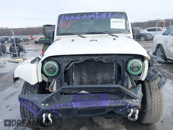 2010 Jeep Wrangler Unlimited Sahara with VIN 1J4HA5H19AL177179, listed as a IAAI auction lot 41565342 with 181,392 mi miles. Bid and sale history available at carsss.com. Image 13.