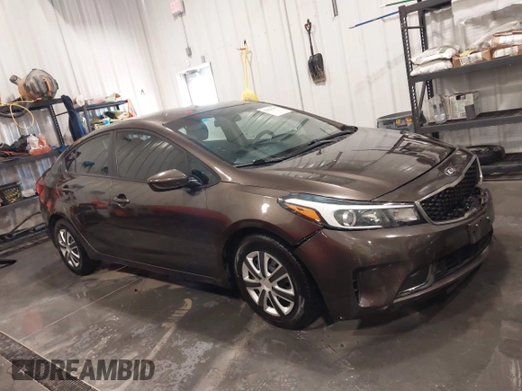 2017 Kia Forte LX with VIN 3KPFK4A71HE056667, listed as a IAAI auction lot 42030307 with 99,320 mi miles. Bid and sale history available at carsss.com. Image 13.