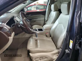 2016 Cadillac SRX Luxury Collection z VIN 3GYFNEE30GS583467, wystawiony jako Copart lot #57831135 z przebiegiem 139 890 mil mil oraz Szkoda całkowita • Salvage title. Historia ofert i sprzedaży dostępna na DreamBid. Obrazek 7.