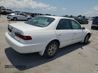 1998 Toyota Camry LE z VIN JT2BG22K9W0145537, wystawiony jako Copart lot #59018505 z przebiegiem 301 595 mil mil oraz Czysty tytuł • Clean title. Historia ofert i sprzedaży dostępna na DreamBid. Obrazek 3.
