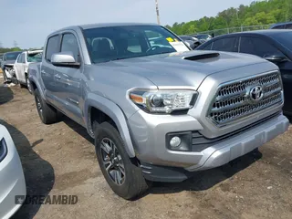 2017 Toyota Tacoma SR5 with VIN 5TFAZ5CN3HX042874, listed as a IAAI auction lot 42022752 with 104,013 mi miles. Bid and sale history available at carsss.com. Image 1.