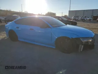 2015 Audi RS 7 Prestige z VIN WUAW2AFC8FN900199, wystawiony jako Copart lot #86767954 z przebiegiem 80 346 mil mil oraz Szkody całkowita. Historia ofert i sprzedaży dostępna na DreamBid. Obrazek 4.