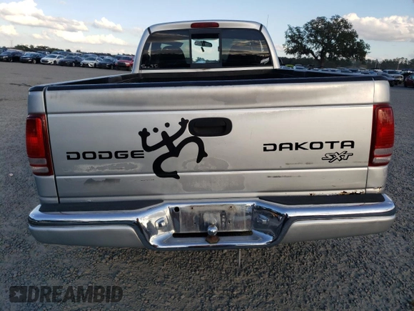 2003 Dodge Dakota with VIN 1D7GG16X33S130101, listed as a Copart auction lot 85999314 with 221,292 mi miles and Salvage Title. Bid and sale history available at carsss.com. Image 6.