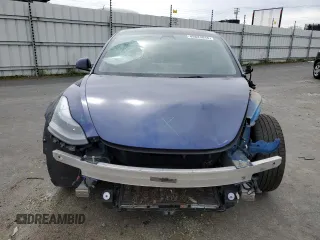 2023 Tesla Model 3 Long Range with VIN 5YJ3E1EB0PF388986, listed as a Copart auction lot 49823045 with 93,870 mi miles and Salvage Title. Bid and sale history available at DreamBid. Image 5.
