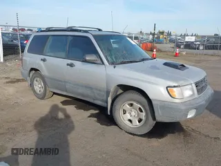 2000 Subaru Forester L with VIN JF1SF6355YH721788, listed as a IAAI auction lot 41736026 with 305,157 mi miles. Bid and sale history available at carsss.com. Image 1.