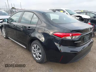 2023 Toyota Corolla LE with VIN 5YFB4MDE0PP067417, listed as a IAAI auction lot 42144017 with 51,652 mi miles. Bid and sale history available at carsss.com. Image 3.