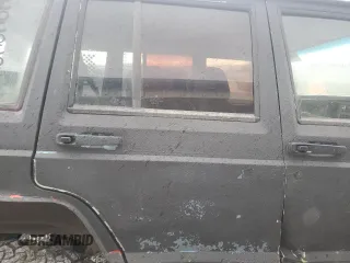 1993 Jeep Cherokee Sport with VIN 1J4FJ68S6PL506709, listed as a Copart auction lot 86638434 with 253,923 mi miles and Salvage Title. Bid and sale history available at carsss.com. Image 11.