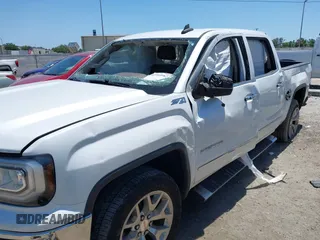 2017 GMC Sierra 1500 SLT z VIN 3GTU2NEC9HG506851, wystawiony jako IAAI lot #42160982 z przebiegiem 188 220 mil mil oraz . Historia ofert i sprzedaży dostępna na DreamBid. Obrazek 6.