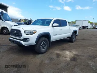 2018 Toyota Tacoma SR5 with VIN 3TMDZ5BN5JM048038, listed as a IAAI auction lot 42084922 with 79,718 mi miles and . Bid and sale history available at DreamBid. Image 17.