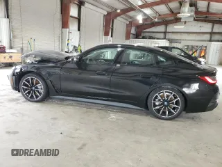 2022 BMW i4 eDrive40 with VIN WBY73AW03NFM94635, listed as a Copart auction lot 60828383 with 4,570 mi miles. Bid and sale history available at carsss.com. Image 2.