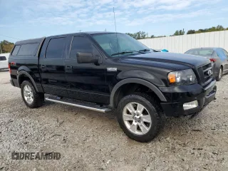 2004 Ford F-150 XLT with VIN 1FTPW145X4KC95658, listed as a Copart auction lot 71197604 with 219,018 mi miles and Salvage Title. Bid and sale history available at carsss.com. Image 4.