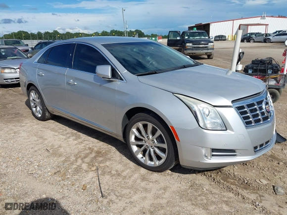 2015 Cadillac XTS Luxury with VIN 2G61N5S36F9251701, listed as a IAAI auction lot 40315224 with 99,918 mi miles. Bid and sale history available at carsss.com. Image 1.