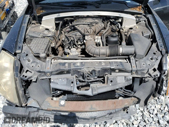 2011 Cadillac CTS z VIN 1G6DA5EY0B0119506, wystawiony jako Copart lot #60086105 z przebiegiem 174 946 mil mil oraz Nie do naprawy • Non repairable. Historia ofert i sprzedaży dostępna na DreamBid. Obrazek 11.