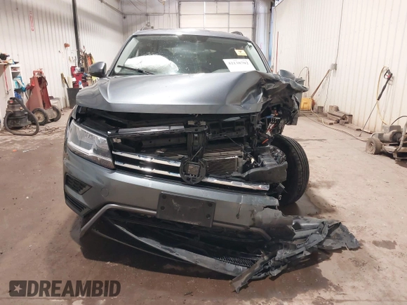2021 Volkswagen Tiguan SE with VIN 3VV3B7AX3MM118463, listed as a IAAI auction lot 42138702 with 48,058 mi miles and . Bid and sale history available at DreamBid. Image 13.