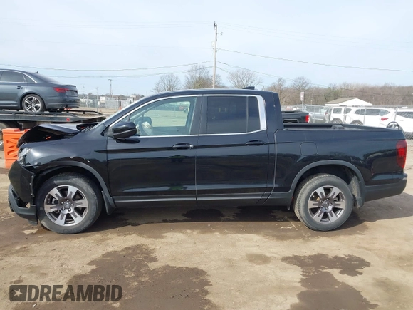 2017 Honda Ridgeline RTL z VIN 5FPYK3F59HB014002, wystawiony jako IAAI lot #41781159 z przebiegiem 110 393 mil mil oraz . Historia ofert i sprzedaży dostępna na DreamBid. Obrazek 15.