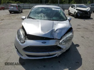 2019 Ford Fiesta SE z VIN 3FADP4EJ2KM142992, wystawiony jako Copart lot #55204795 z przebiegiem 98 018 mil mil oraz Szkody całkowita. Historia ofert i sprzedaży dostępna na DreamBid. Obrazek 5.