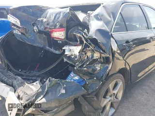 2014 Toyota Camry L with VIN 4T1BF1FK2EU817293, listed as a IAAI auction lot 41882906 with 189,719 mi miles. Bid and sale history available at carsss.com. Image 6.