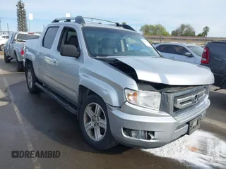 2010 Honda Ridgeline RTL z VIN 5FPYK1F55AB011303, wystawiony jako IAAI lot #41845659 z przebiegiem 237 460 mil mil oraz . Historia ofert i sprzedaży dostępna na DreamBid. Obrazek 1.