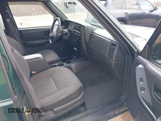 2000 Jeep Cherokee Classic with VIN 1J4FF58S3YL258755, listed as a IAAI auction lot 42020260 with 228,867 mi miles. Bid and sale history available at carsss.com. Image 5.