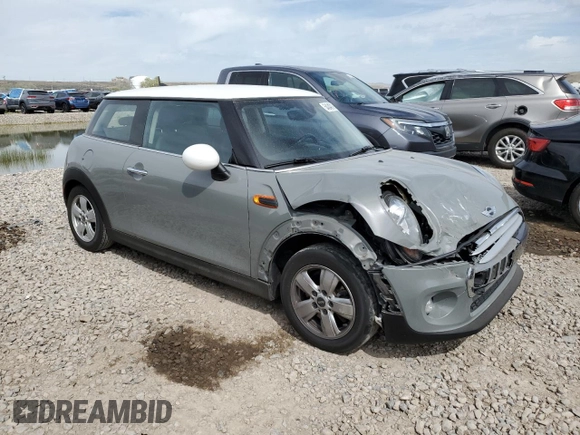2015 MINI Hardtop with VIN WMWXM5C53FT941132, listed as a Copart auction lot 54340195 with 127,520 mi miles and Salvage title. Bid and sale history available at DreamBid. Image 4.