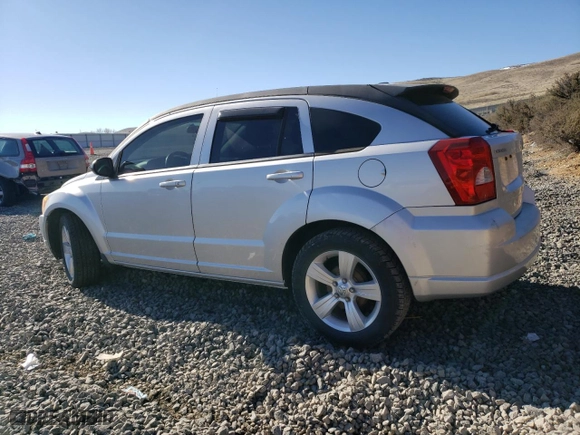 2010 Dodge Caliber SXT with VIN 1B3CB4HA3AD618890, listed as a Copart auction lot 50532615 with 126,068 mi miles and Salvage Title. Bid and sale history available at carsss.com. Image 2.