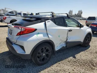 2022 Toyota C-HR XLE with VIN JTNKHMBX4N1130766, listed as a Copart auction lot 50050755 with 119,736 mi miles and Salvage Title. Bid and sale history available at DreamBid. Image 3.