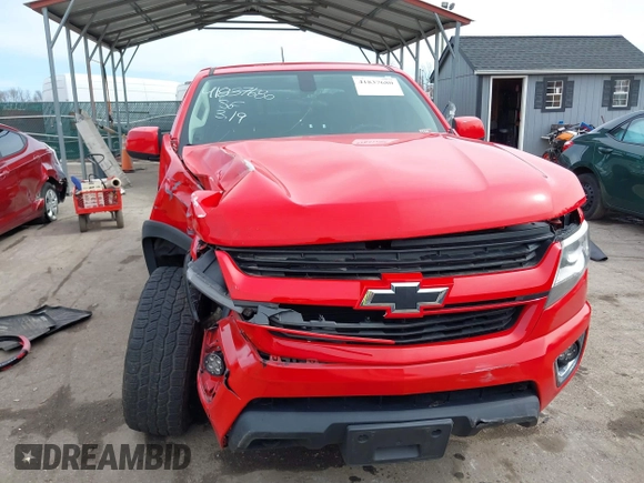 2018 Chevrolet Colorado 4WD Z71 z VIN 1GCGTDEN8J1141945, wystawiony jako IAAI lot #41837680 z przebiegiem 67 686 mil mil oraz . Historia ofert i sprzedaży dostępna na DreamBid. Obrazek 6.