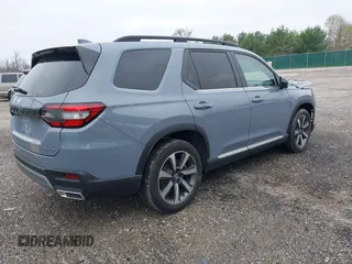 2024 Honda Pilot Elite with VIN 5FNYG1H89RB028392, listed as a IAAI auction lot 42031042 with 18,685 mi miles. Bid and sale history available at carsss.com. Image 4.