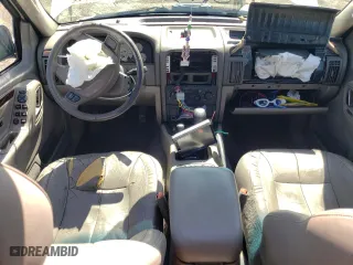 2003 Jeep Grand Cherokee Limited with VIN 1J4GW58N83C511981, listed as a Copart auction lot 61734014 with 174,775 mi miles and Salvage Title. Bid and sale history available at carsss.com. Image 8.