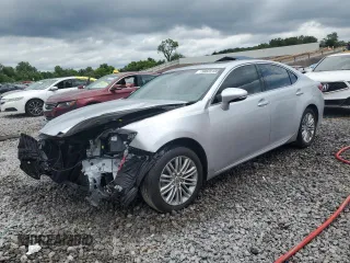 2014 Lexus ES 330 with VIN JTHBK1GG5E2138588, listed as a Copart auction lot 58828185 with 64,911 mi miles and Salvage title. Bid and sale history available at DreamBid. Image 1.