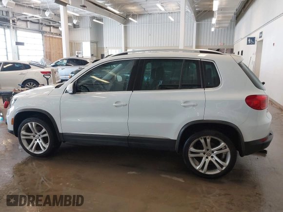 2016 Volkswagen Tiguan S with VIN WVGBV7AX0GW532236, listed as a IAAI auction lot 41610575 with 104,193 mi miles and . Bid and sale history available at DreamBid. Image 13.